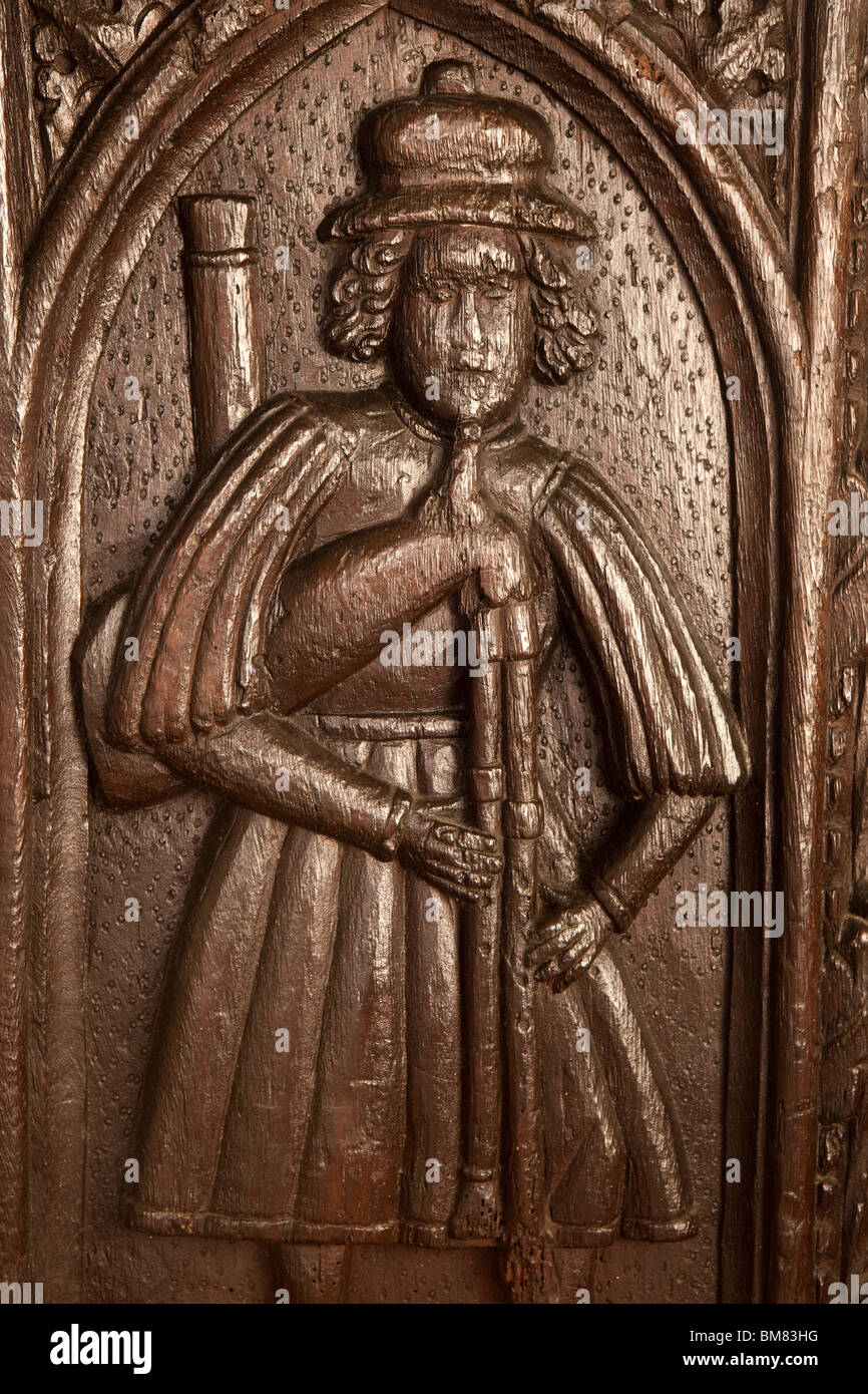 Großbritannien, Cornwall, Altarnun, Pfarrkirche St Nonna, Dudelsackspieler geschnitzten hölzernen Pew Ende Stockfoto