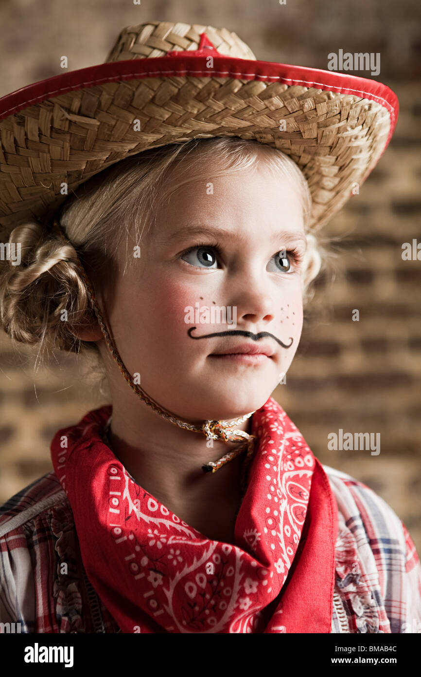 Junges Mädchen verkleidet als cowgirl Stockfoto