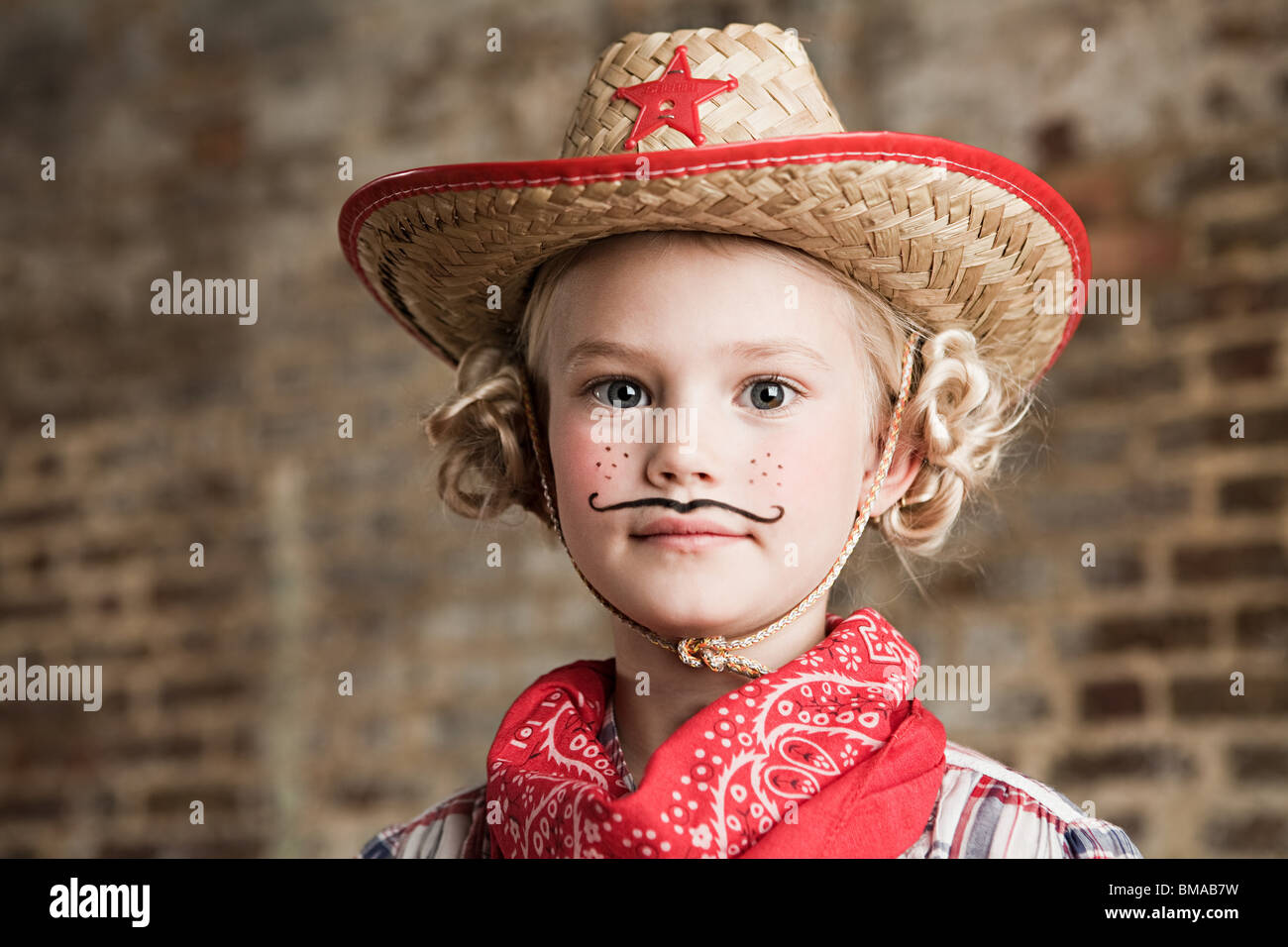 Junges Mädchen verkleidet als cowgirl Stockfoto