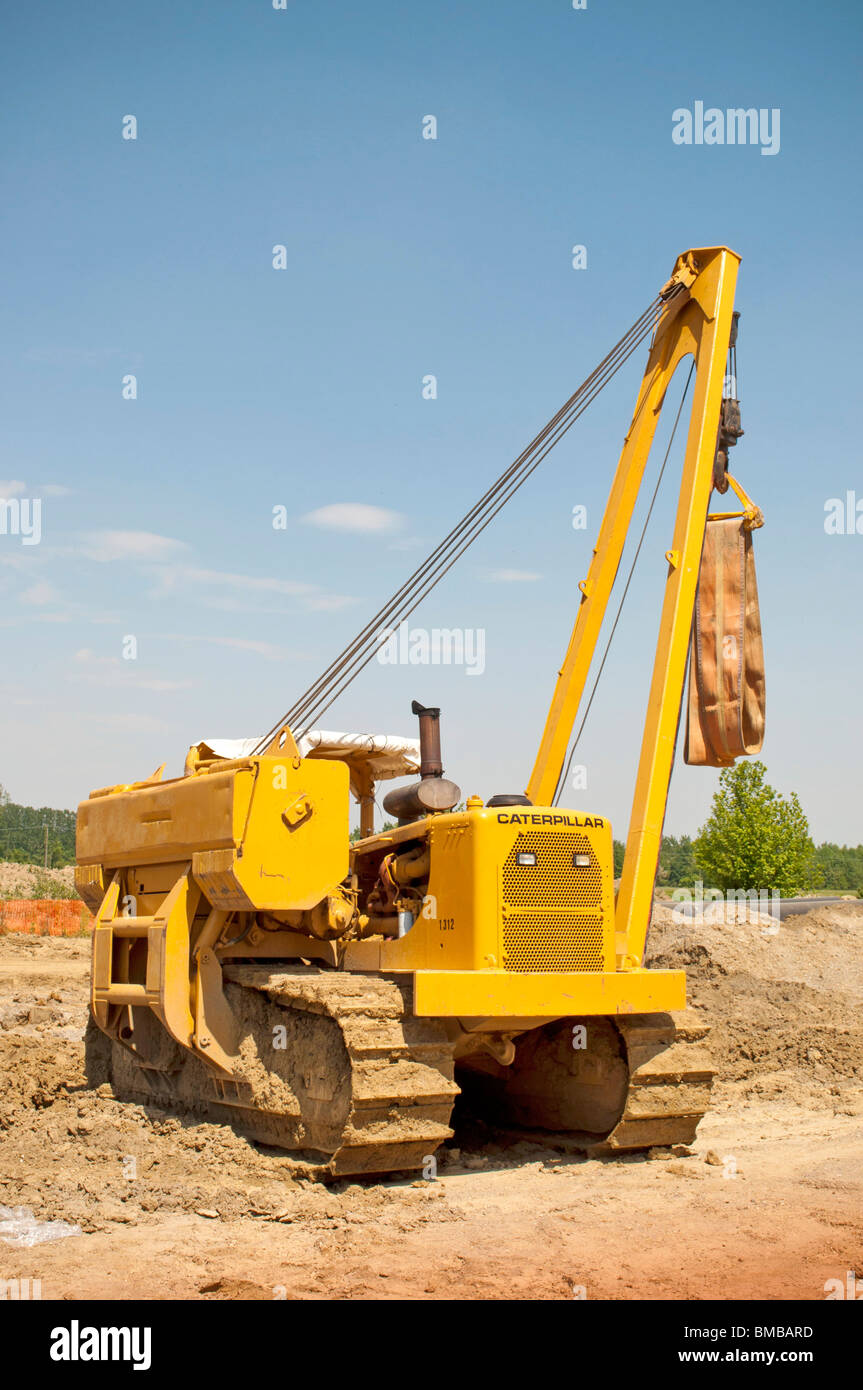 Caterpillar arbeiten auf der Baustelle posiert Rohr Stockfoto