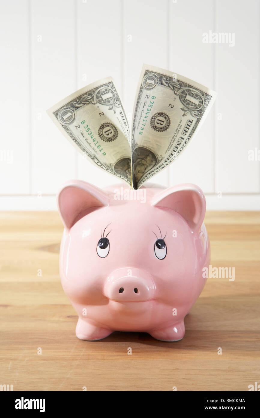 Sparschwein und Geld Stockfoto