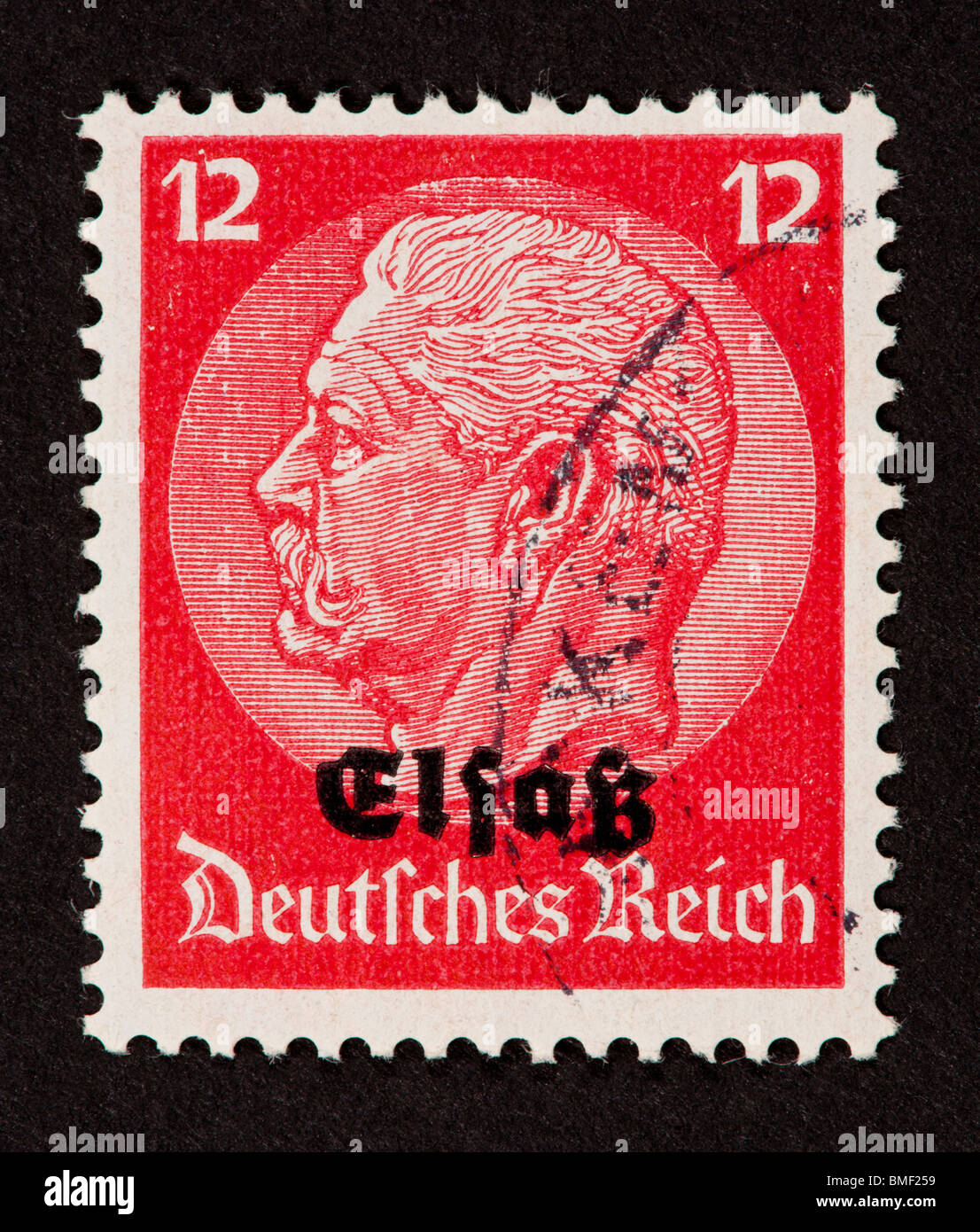 Briefmarke aus Deutschland für die Besetzung des Elsass, mit Paul von Hindenburg. Stockfoto