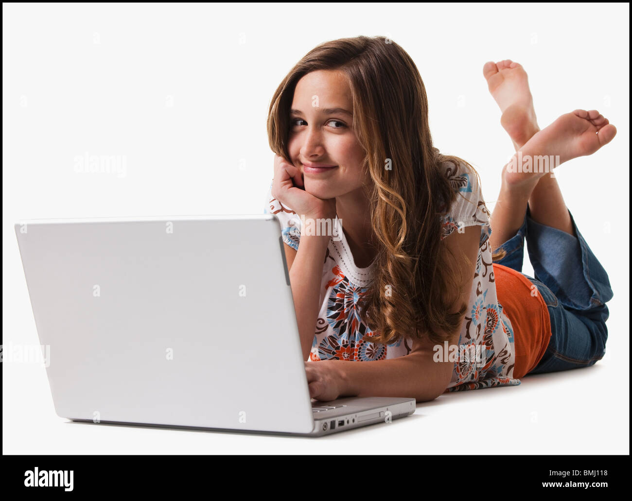 Junges Mädchen mit laptop Stockfoto