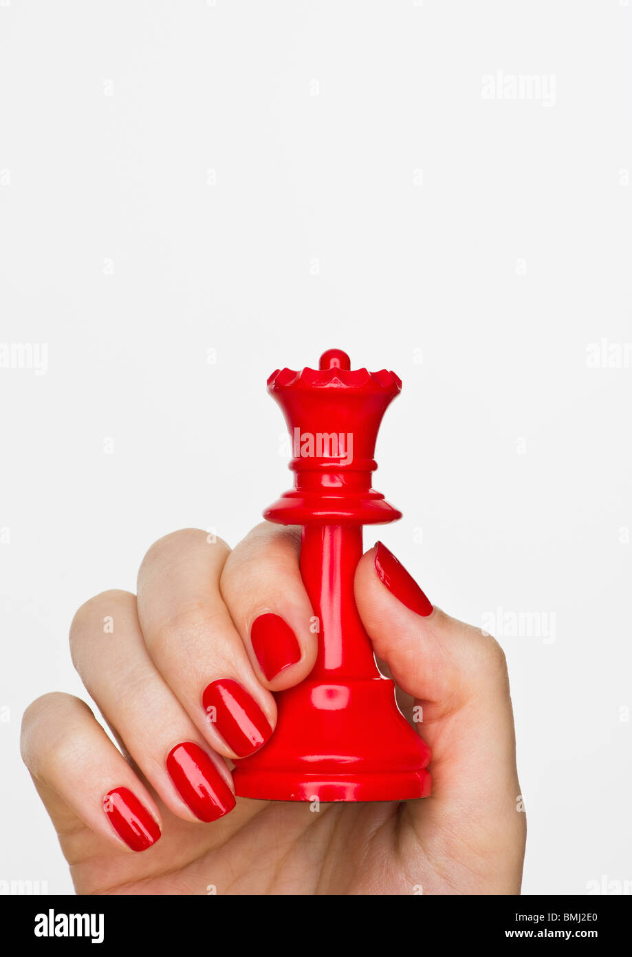 Hand, die Rote Königin Schachfigur Stockfoto
