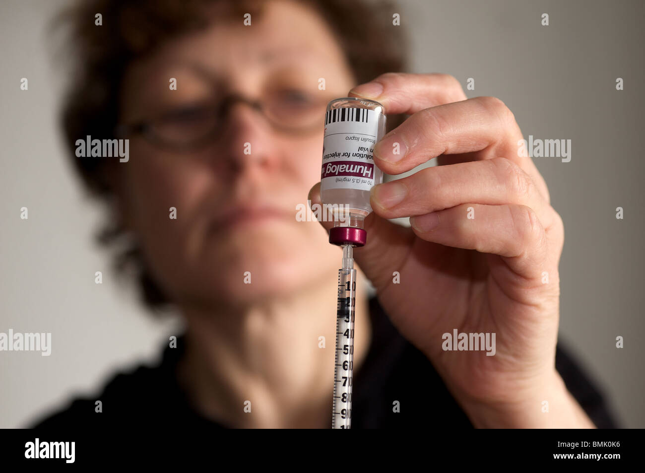 Frau Ausarbeitung Insulininjektion Stockfoto