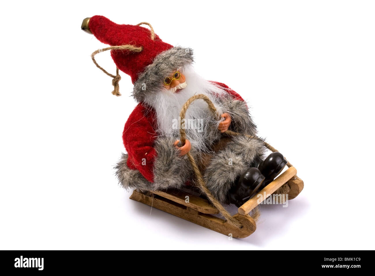Weihnachtsmann auf seinem Schlitten ohne Rentier Stockfoto