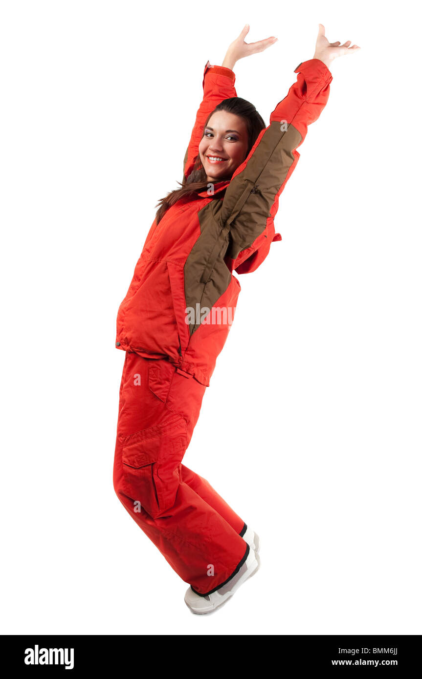 Frau beim Snowboarden rote Jacke mit Händen aufspringend. Isoliert auf weißem Hintergrund Stockfoto