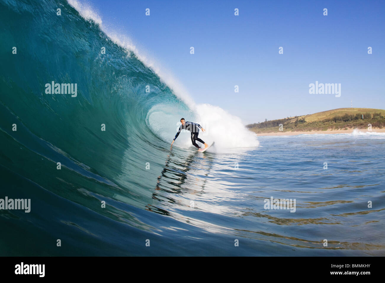 Surfer auf der Welle Stockfoto