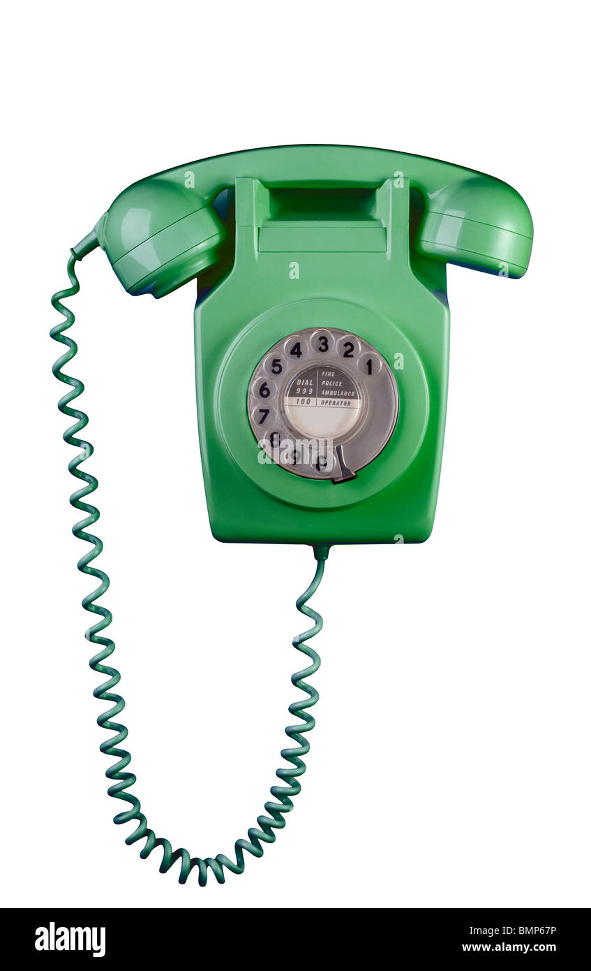 1970er Jahren an der Wand befestigte Telefon, farbig grün. Stockfoto