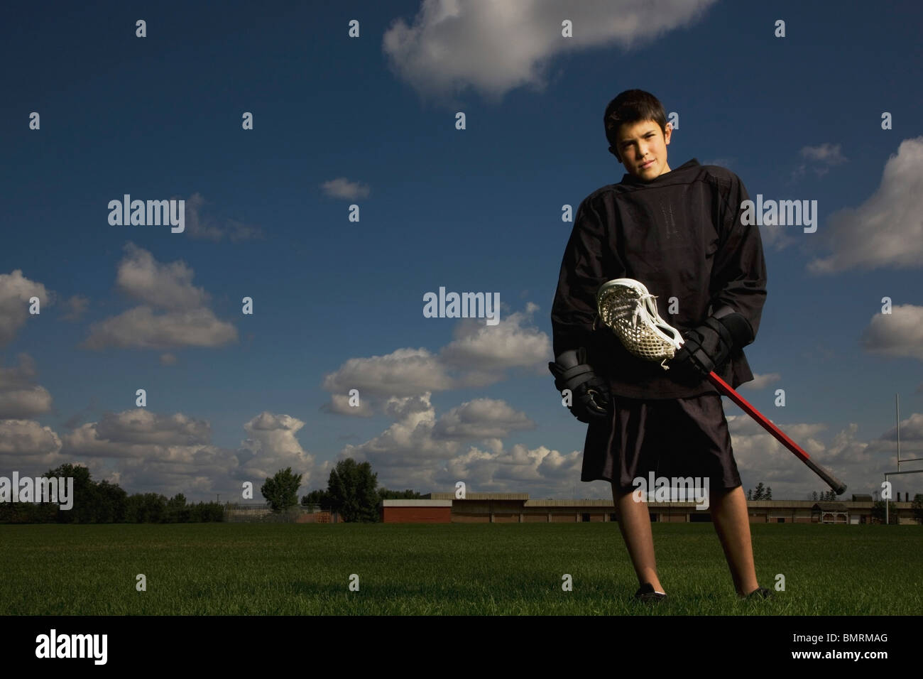 Edmonton, Alberta, Kanada; Ein Junge mit Lacrosse Ausrüstung Stockfoto