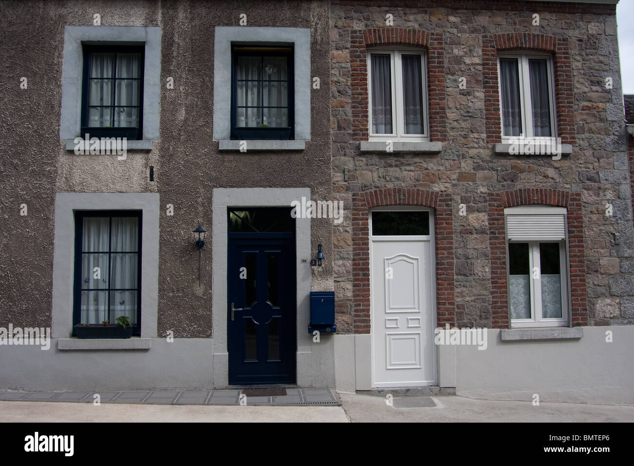 verschiedene Stile Dorf Cottage Häuser Wohnungen Stockfoto