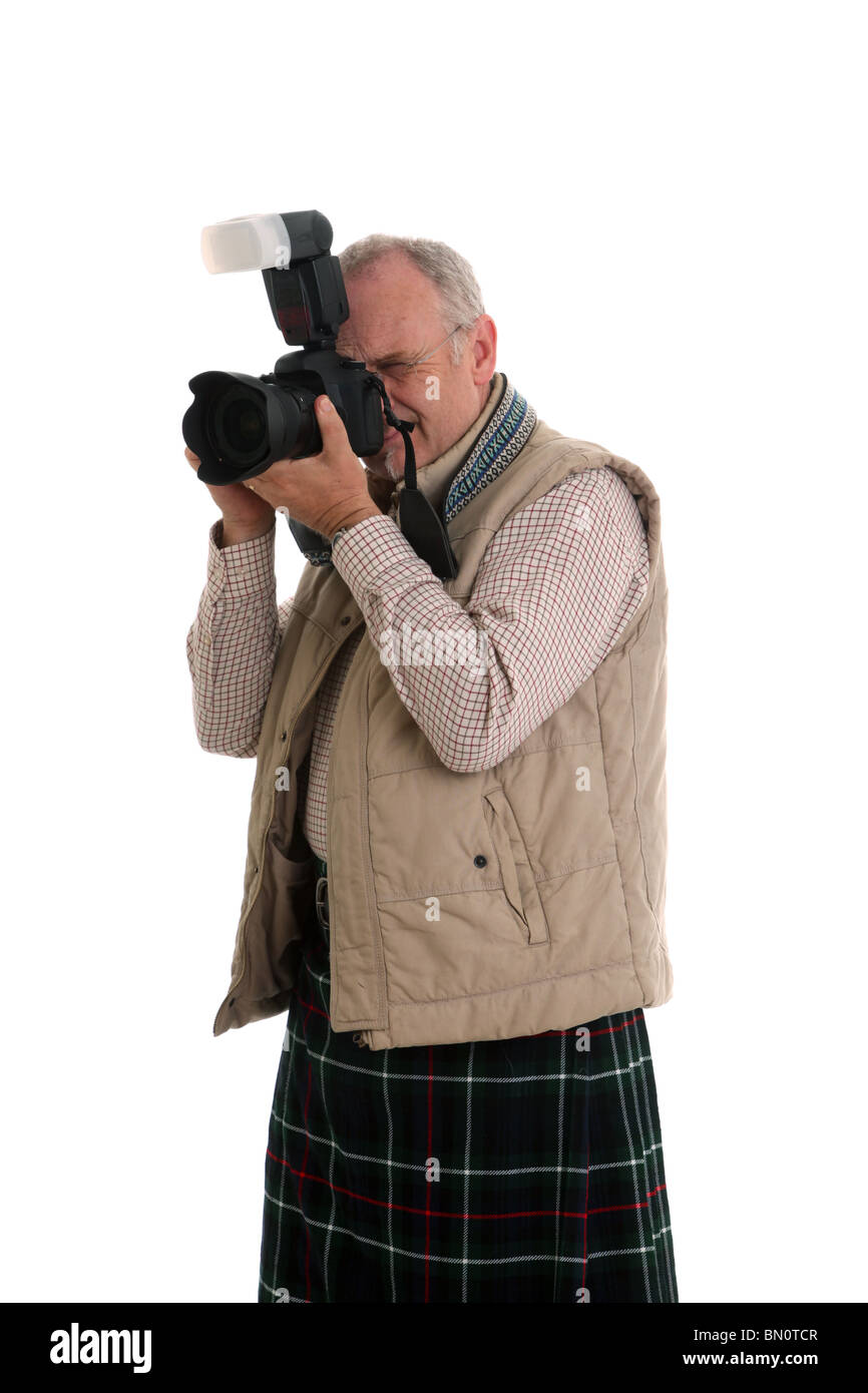 Reife Scots Fotograf in einem Mackenzie Tartan kilt Stockfoto