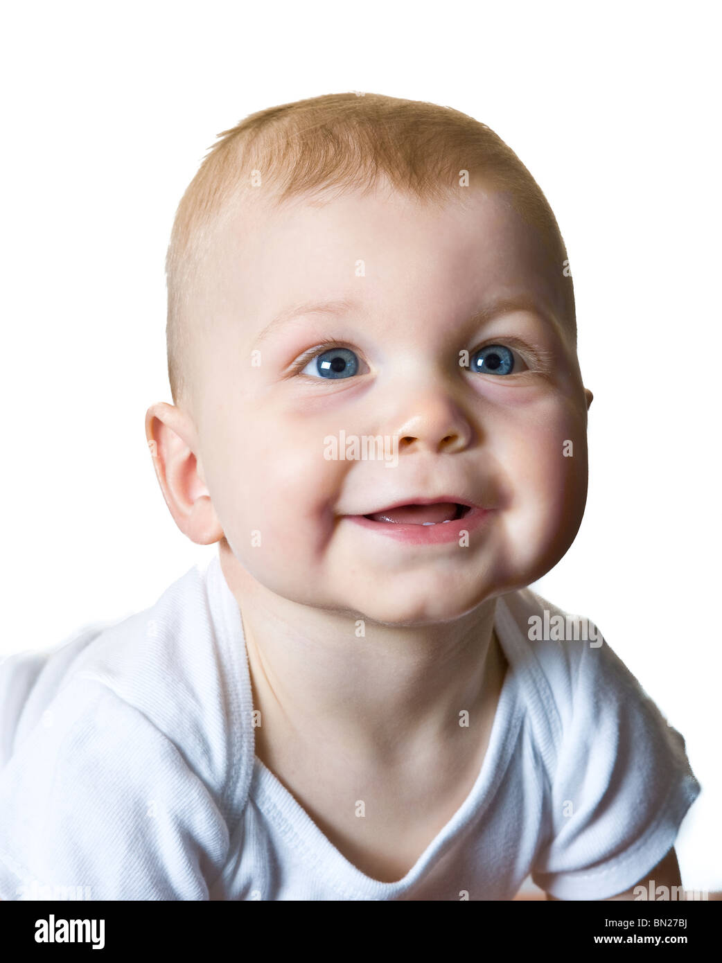 Gesunder 10 Monate alten kaukasischen Baby Junge schaut im Vorgriff auf und er lächelt für die Kamera. Stockfoto