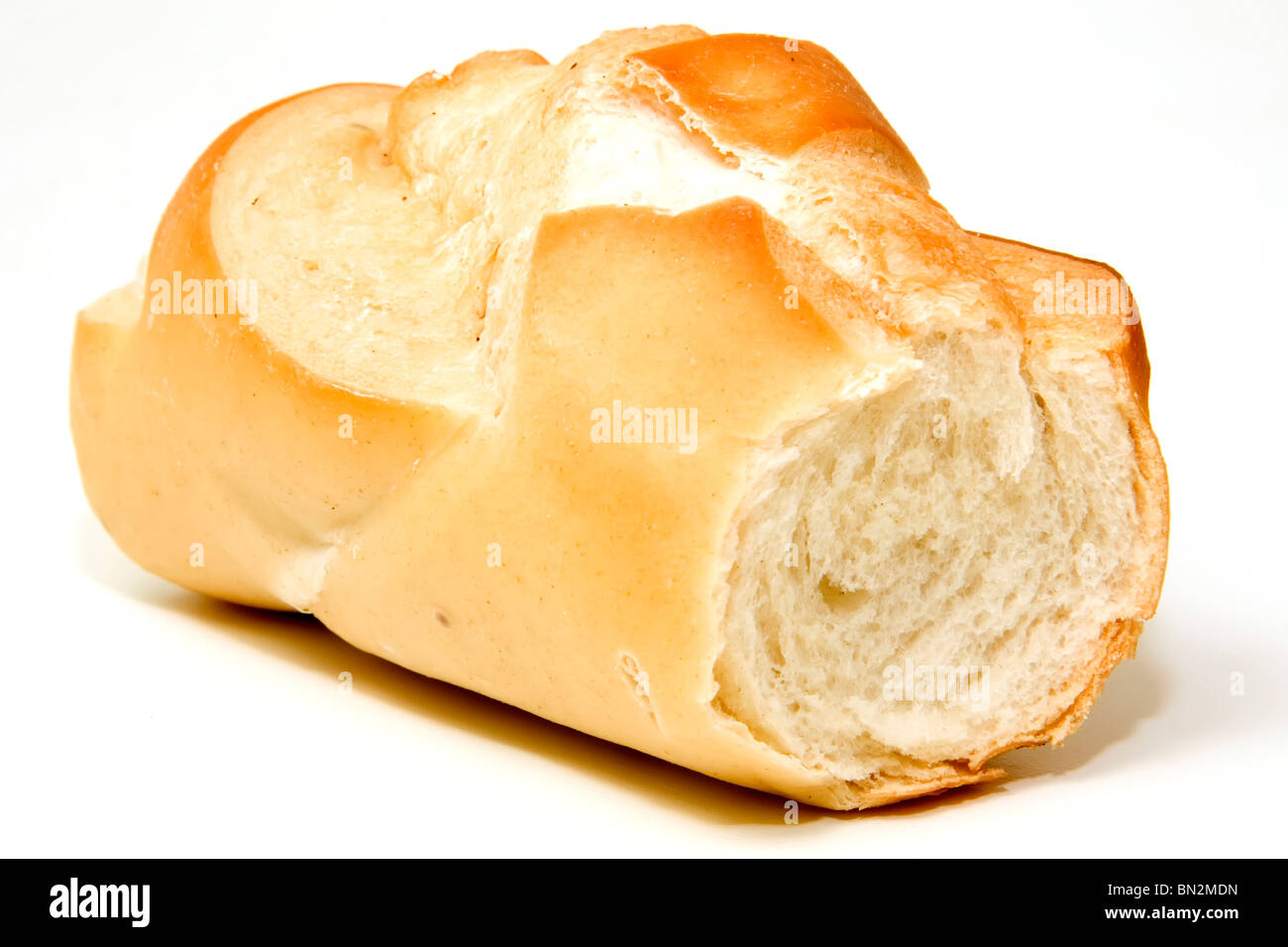 Nur ein Stück Brot auf weißem Hintergrund Stockfoto