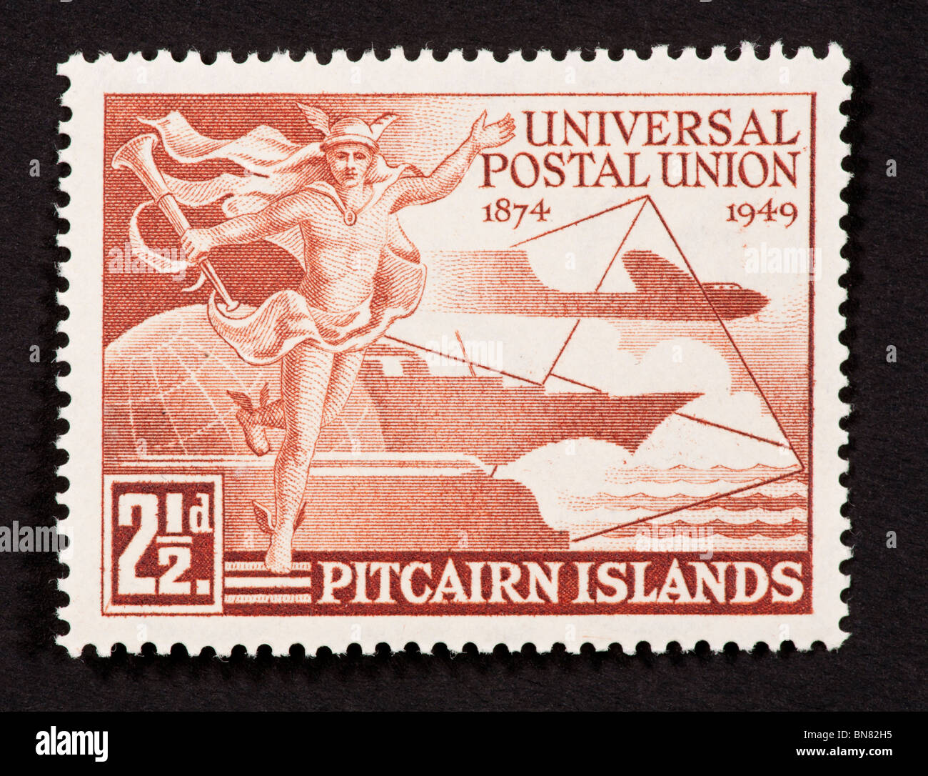 Briefmarke aus der Pitcairn-Inseln für den 75. Jahrestag des Weltpostvereins. Stockfoto