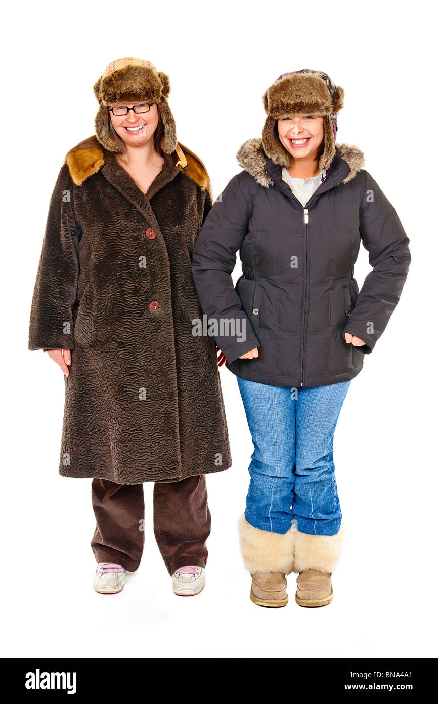 Zwei Frauen in russische Hüte und schwere Mäntel gekleidet. Stockfoto