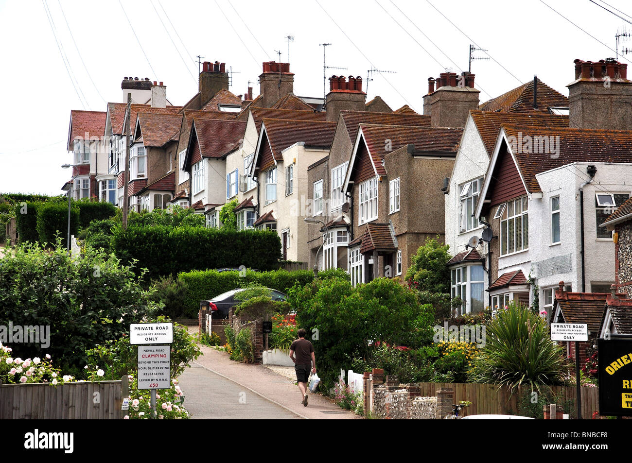 Häuser auf Hügel, Nevill Straße, Rottingdean, East Sussex, England, Vereinigtes Königreich Stockfoto
