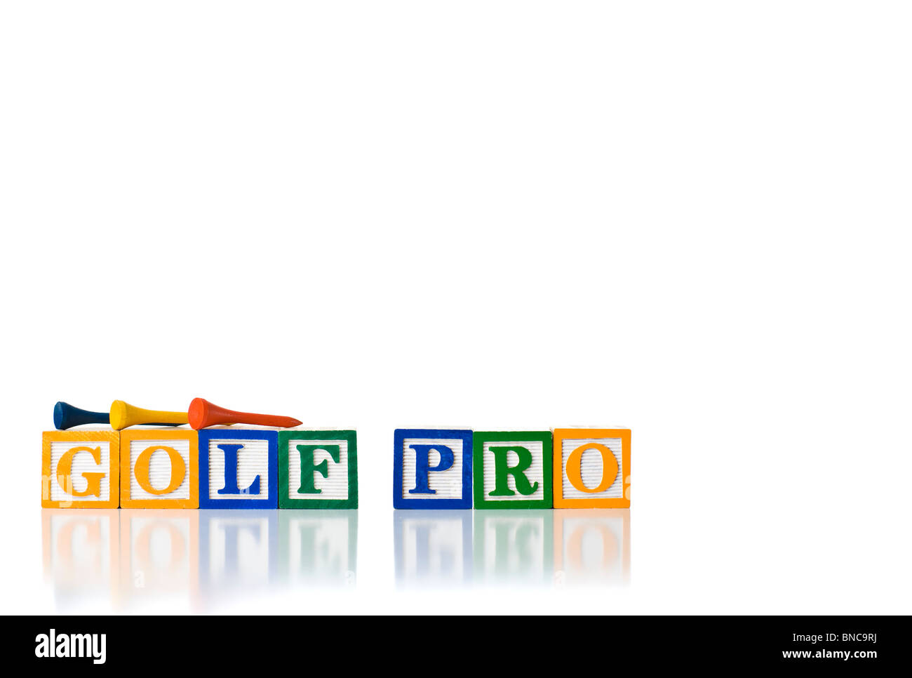 Bunte Kinder-Blöcke Rechtschreibung GOLF PRO mit Golf-tees Stockfoto
