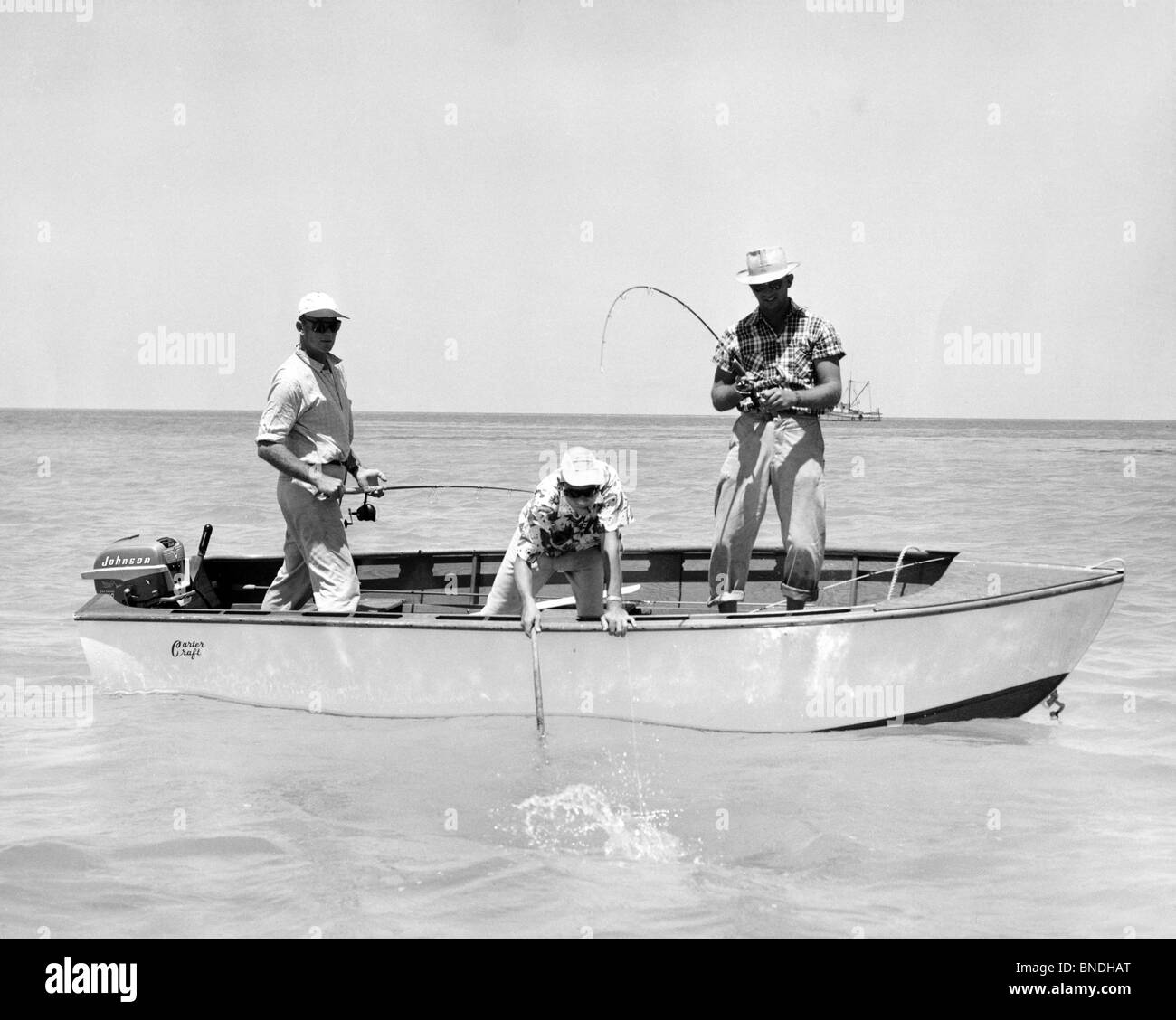 Drei Männer im Meer Angeln Stockfoto