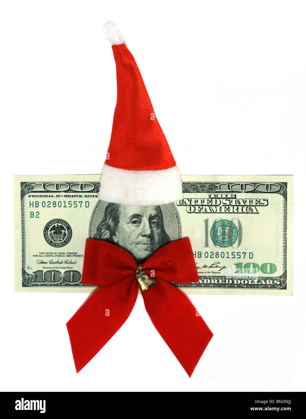 100-Dollar-Banknote in Santas Uniform gekleidet Stockfoto