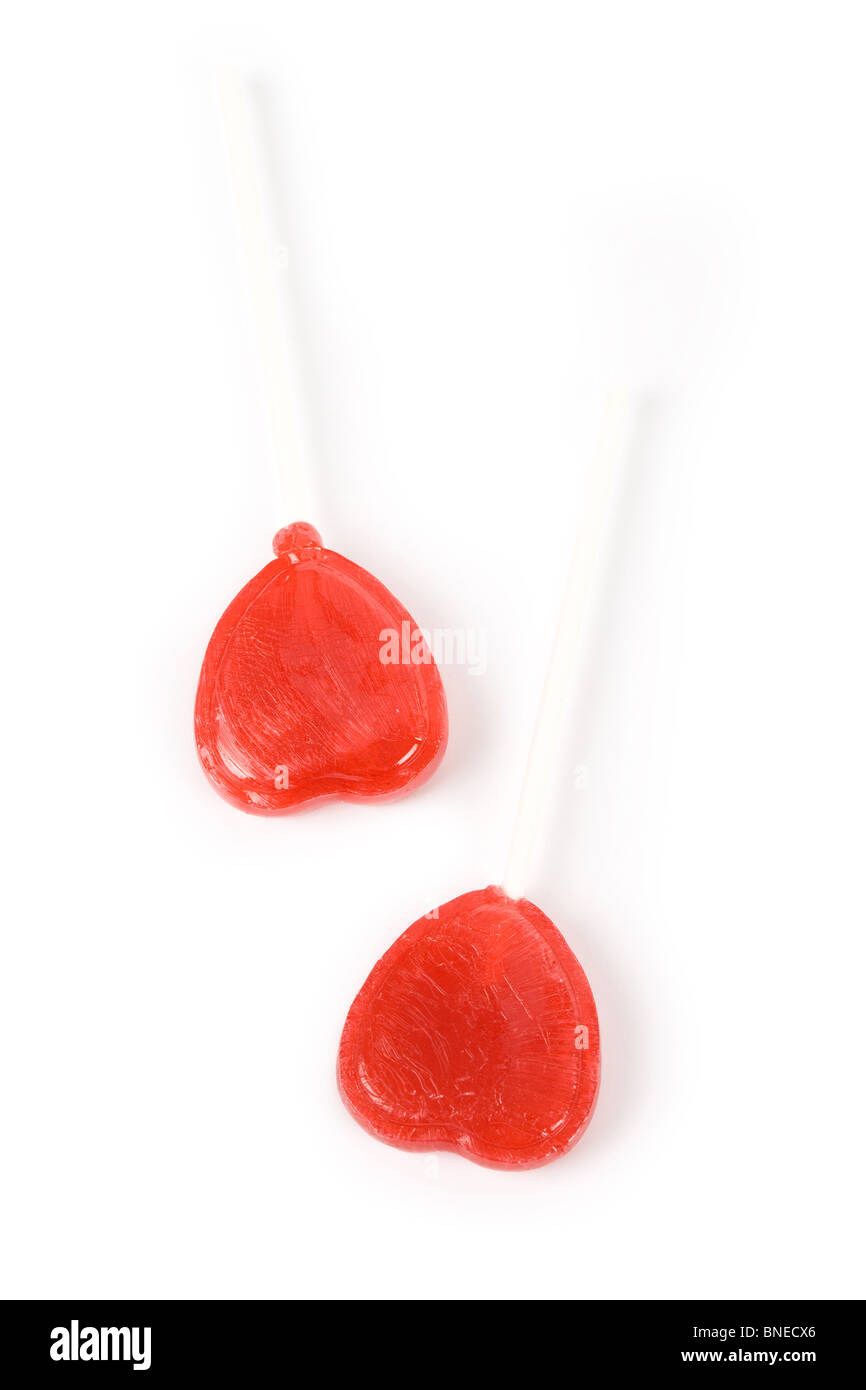 Red Heart Shape Lollipop hautnah Stockfoto
