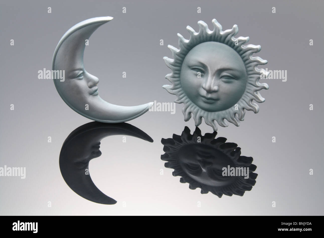 Sonne und Mond Symbole Stockfoto