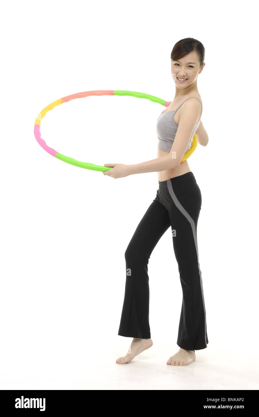 Stretching mit reifen Frau Stockfoto