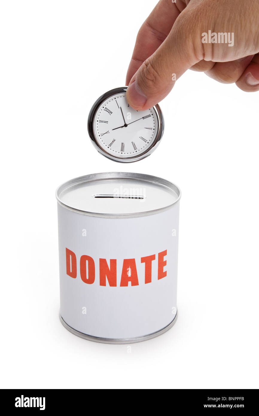 Spendenbox und Uhr, Konzept von "Zeit zu spenden" oder "Spenden Ihre Zeit". Stockfoto