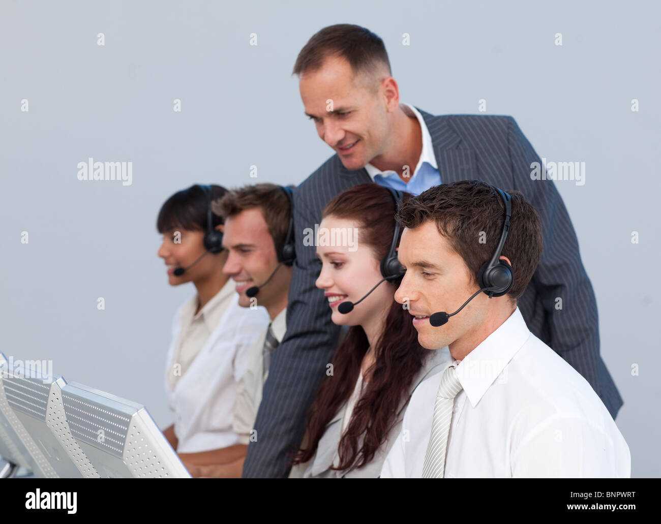 Manager und Teamarbeit in einem Call-center Stockfoto