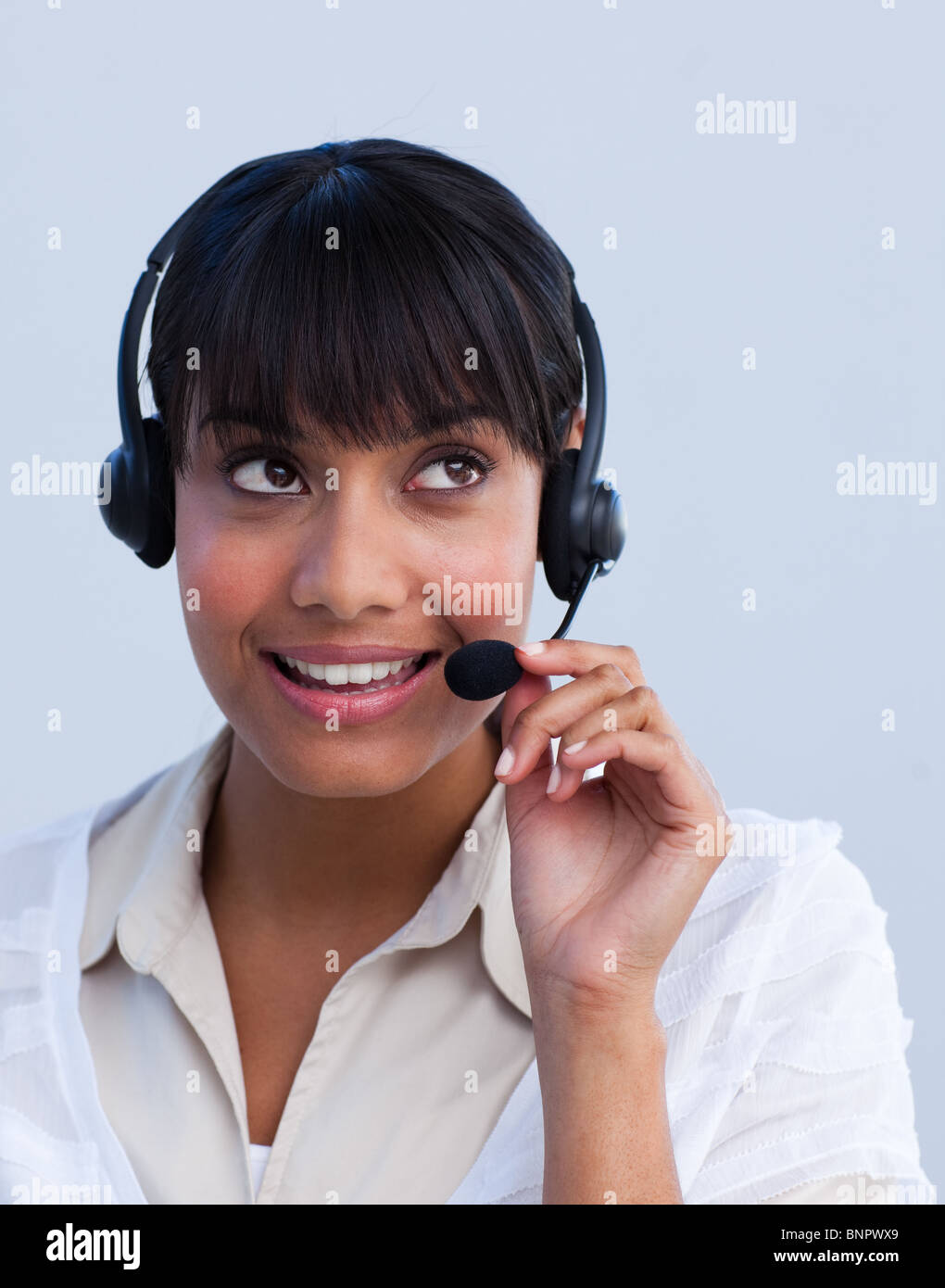 Attraktive Geschäftsfrau, die Arbeit in einem Call-center Stockfoto