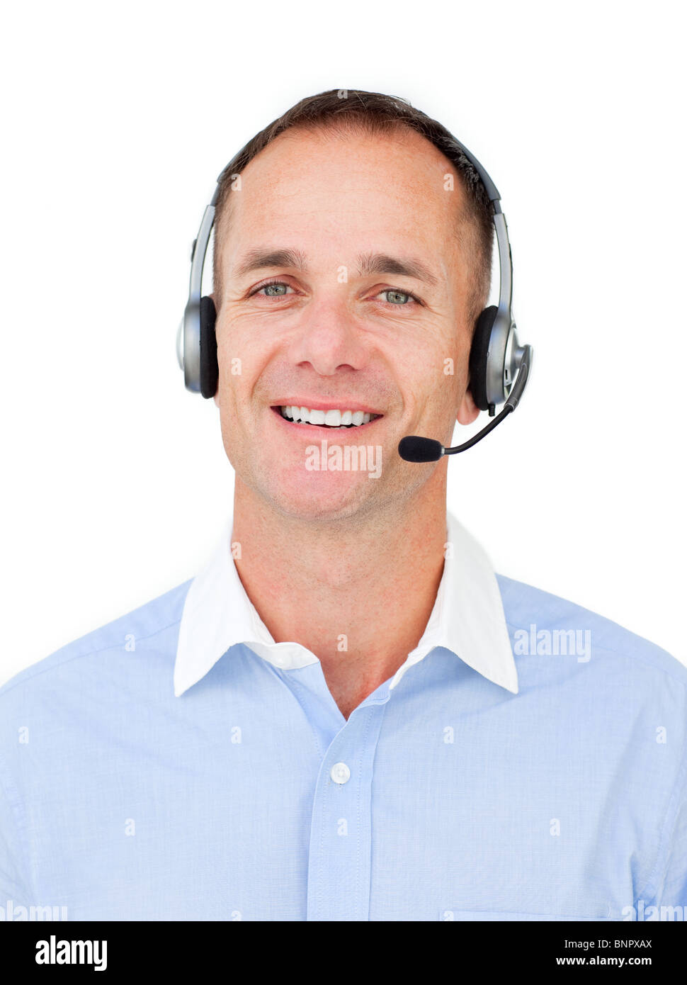 Charmante Kundendienstmitarbeiter sprechen über Kopfhörer Stockfoto
