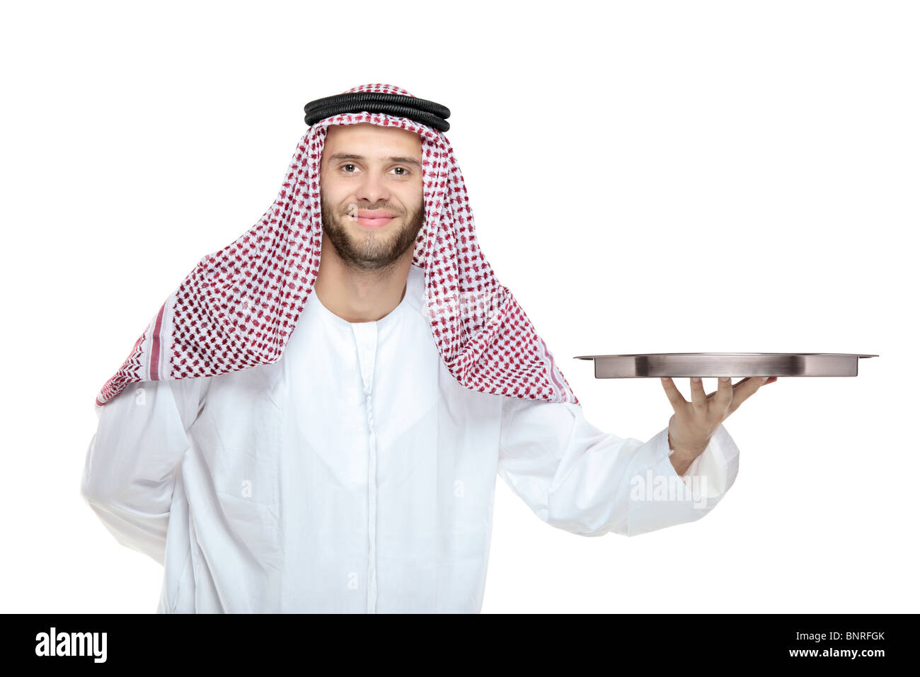 Eine arabische Person, die ein Tablett Stockfoto