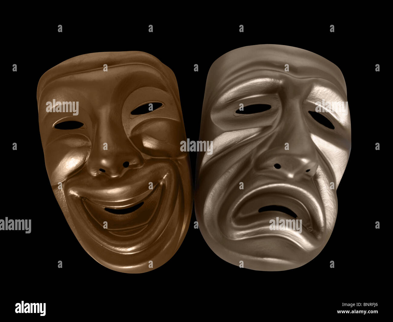 Komik und Tragik Theatermasken, isoliert auf schwarz. Stockfoto