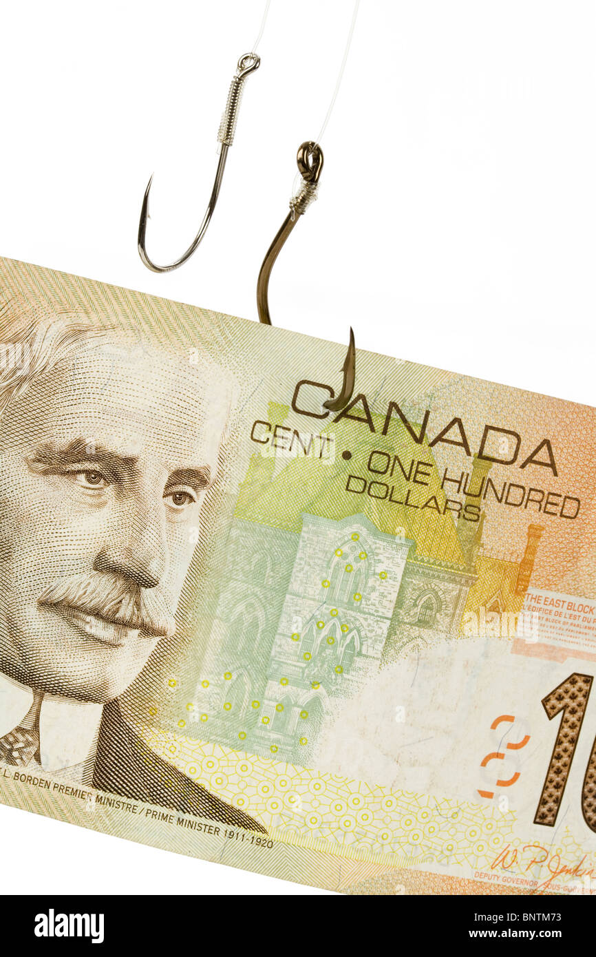 Angeln, Haken und kanadische Dollar Nahaufnahme Schuss Stockfoto