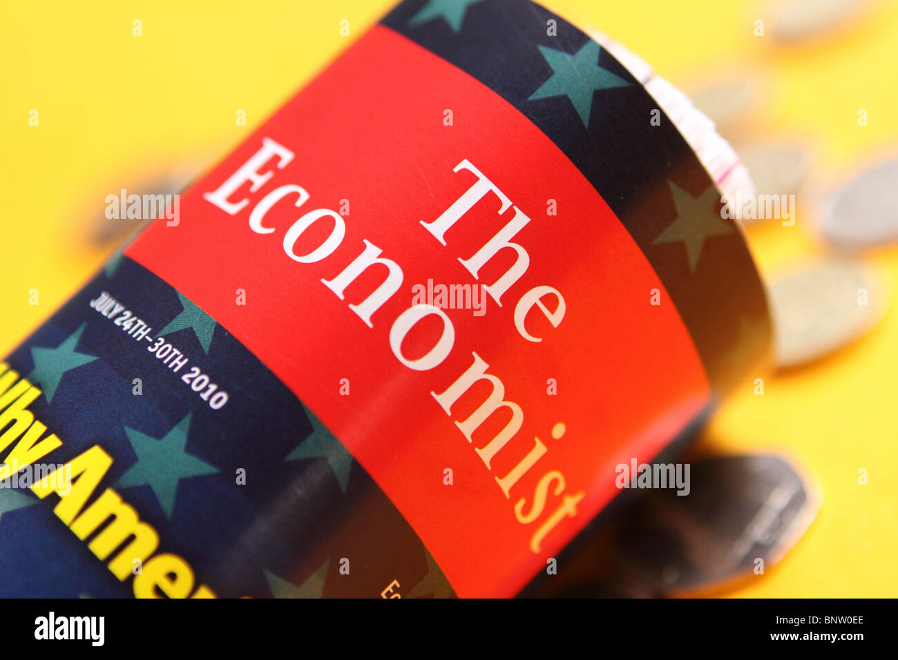 Der Wirtschaftswissenschaftler Zeitschrift Publikation Abdeckung mit Geld Münzen Stockfoto
