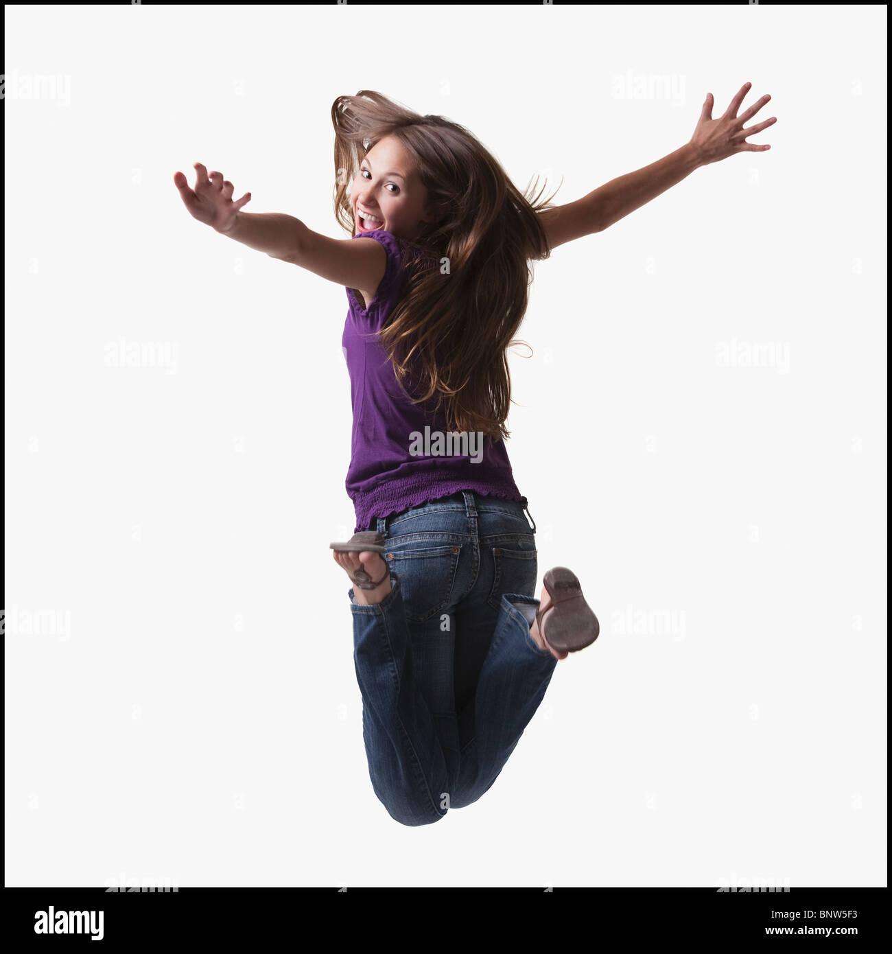 Teenager-Mädchen springen vor Freude Stockfoto