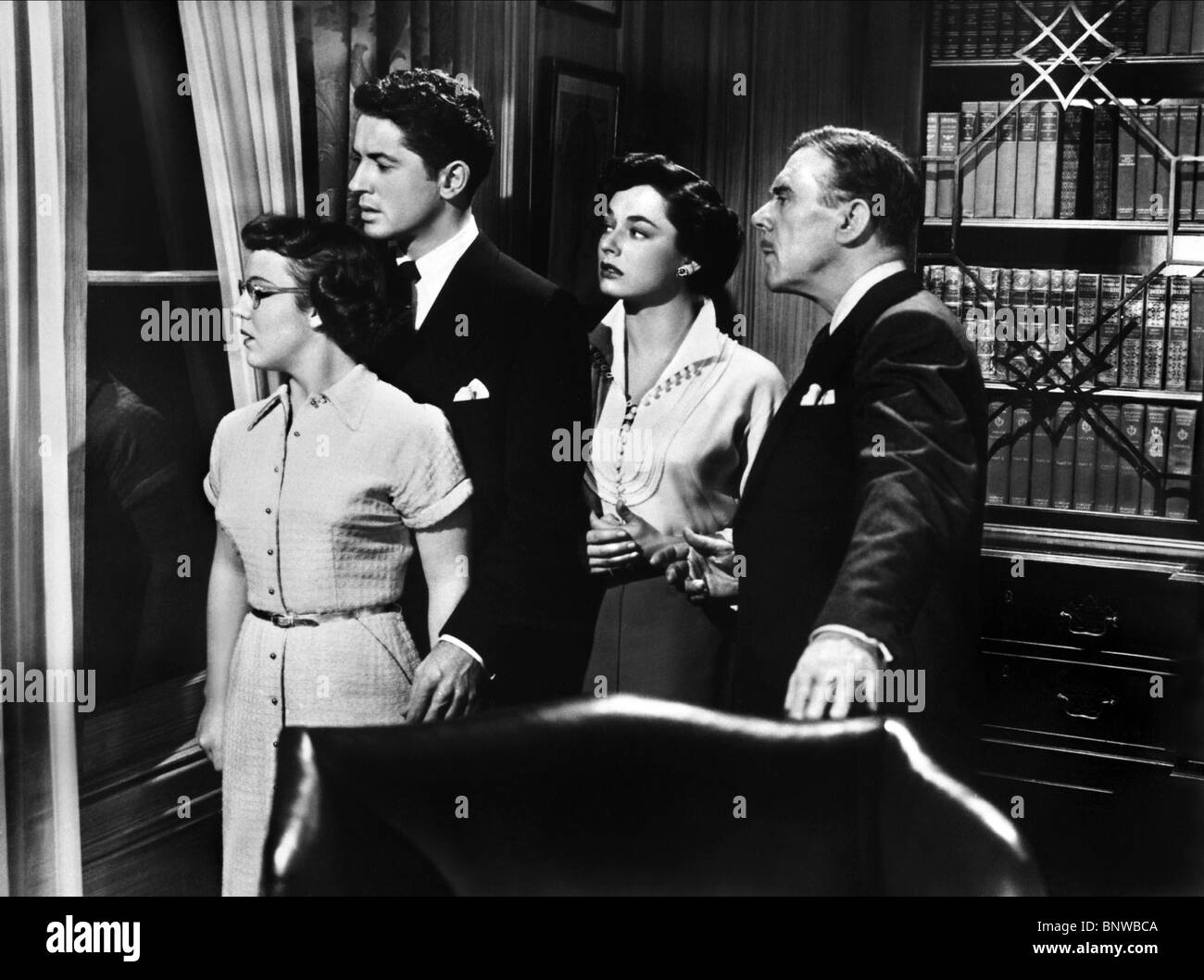 PATRICIA HITCHCOCK, Farley Granger, RUTH ROMAN, LEO G. CARROLL, Fremde im Zug, 1951 Stockfoto