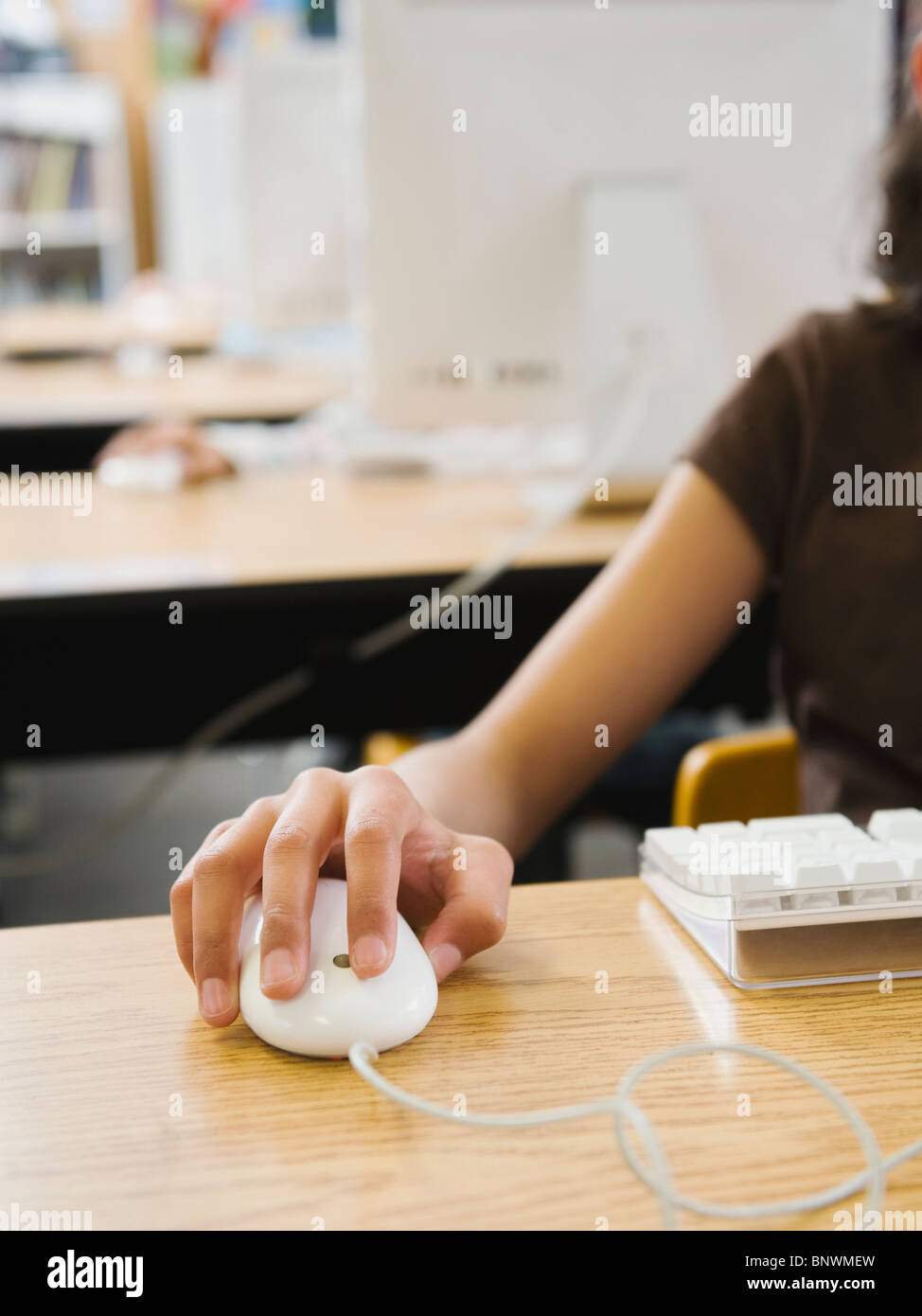 Studenten hand auf Computer-Maus Stockfoto
