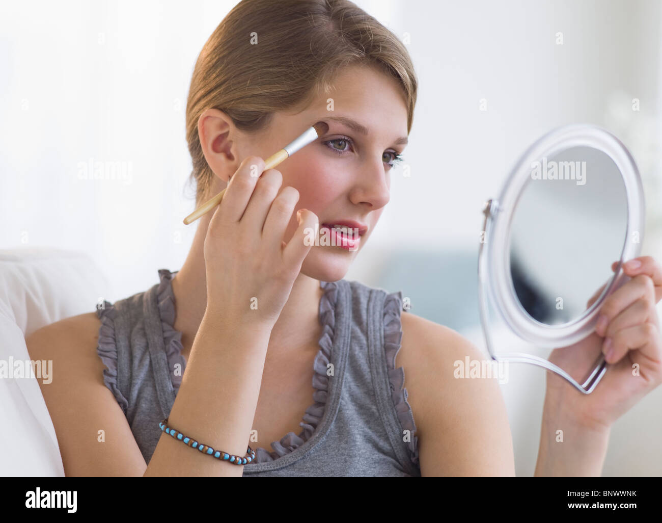 Frau auf Make-up Stockfoto