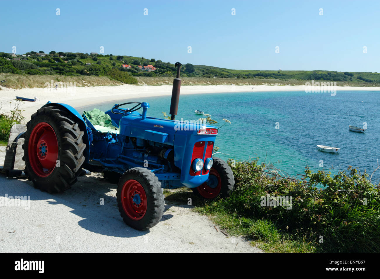 Fordson Super Dexta Traktor, höhere Stadt Bay, St.-Martins Isles of Scilly Cornwall UK. Stockfoto
