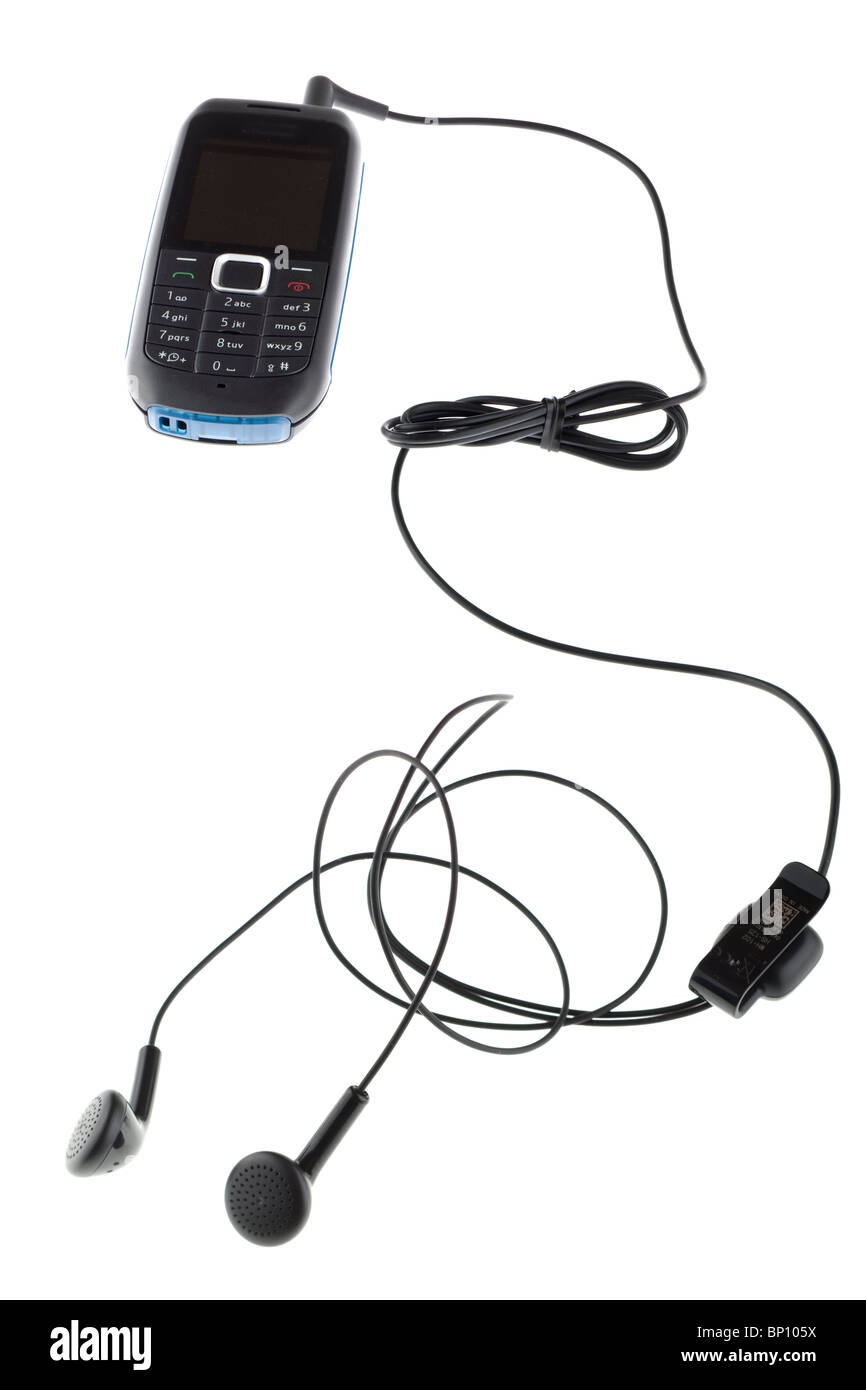 Handy mit angeschlossenen audio-Kabel und Kopfhörer Stockfoto