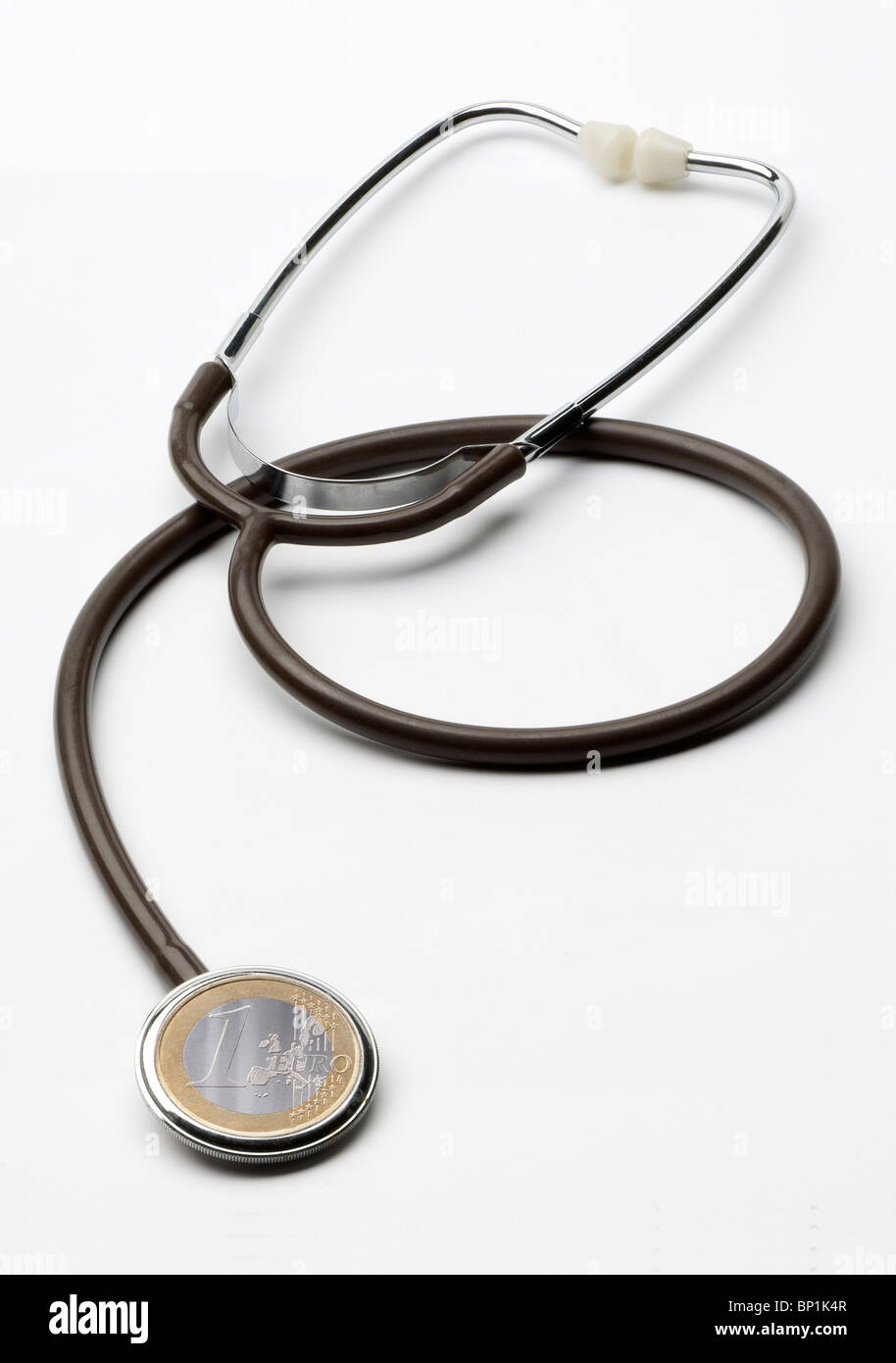 Stethoskop und 1 Euro Münze Stockfoto