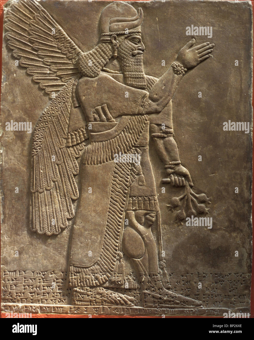 1318. GEFLÜGELTE SCHUTZGEIST, PALAST VON KÖNIG ASSURBANIPAL II, NIMRUD, 9. B.C. Stockfoto