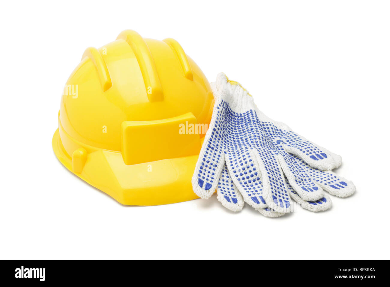 Gelben Bauarbeiterhelm und Baumwoll-Handschuhe auf weißem Hintergrund Stockfoto