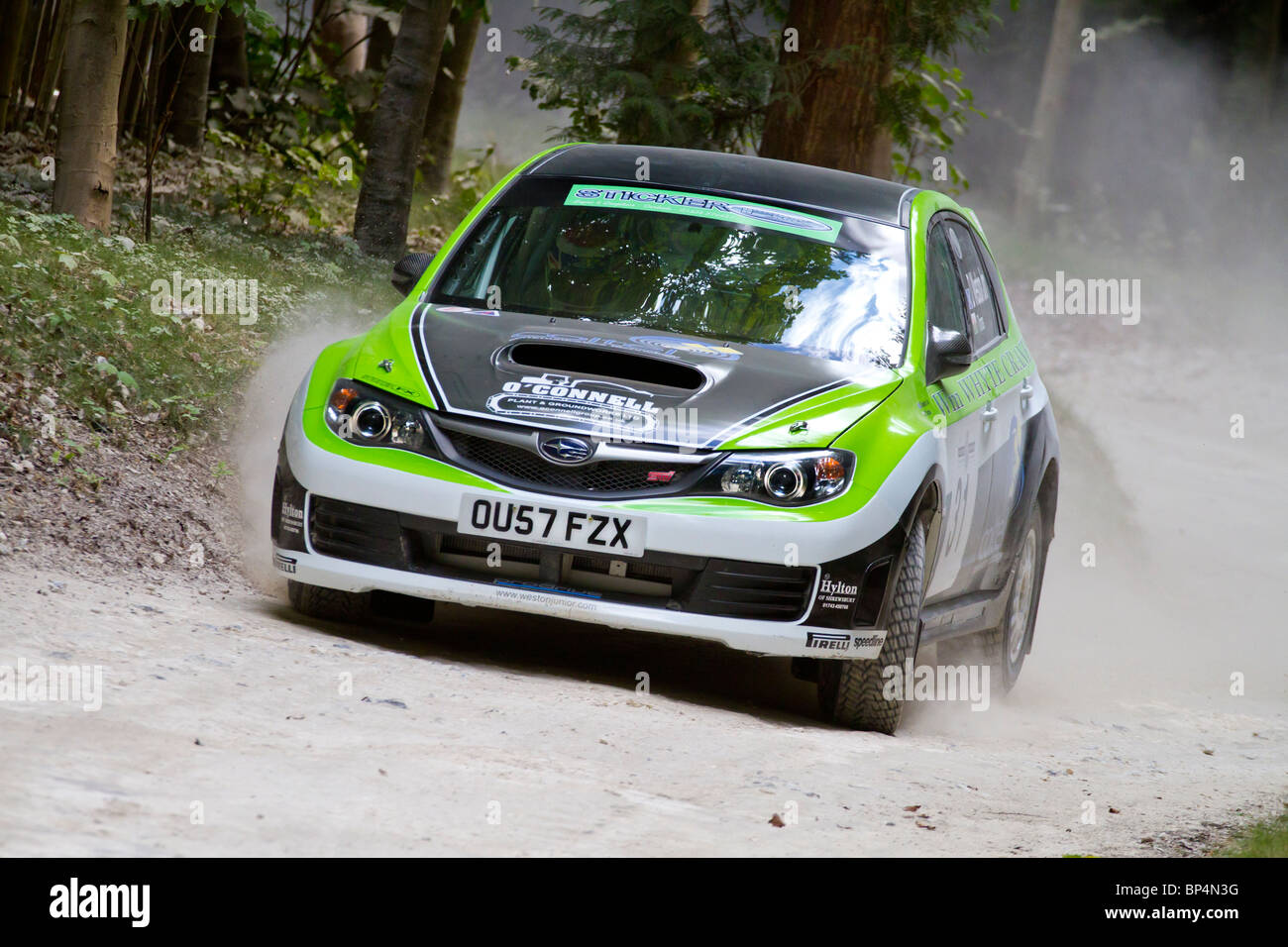 2009 Subaru Impreza GRP N Rallye Auto mit Fahrer Dave Watson Jr. auf dem 2010 Goodwood Festival of Speed, Sussex, England, UK. Stockfoto