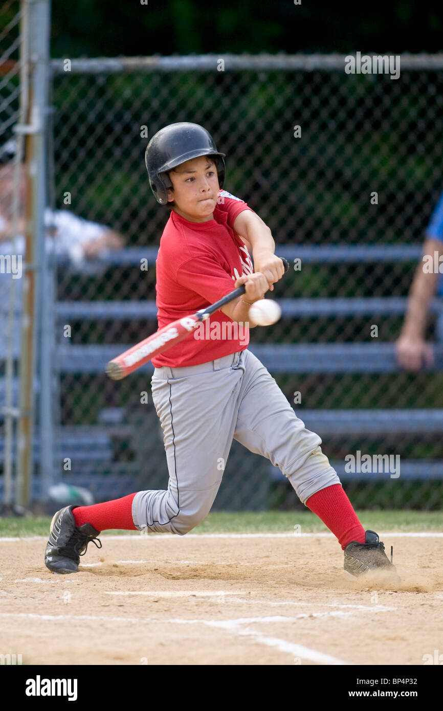 Boys Baseball Spiel Action. Stockfoto