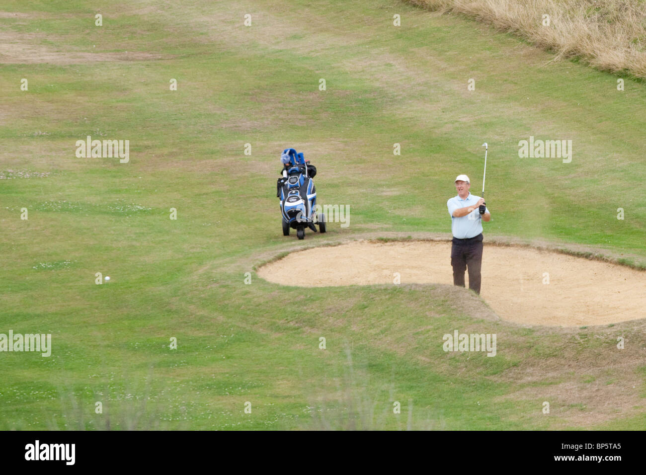 Golfspieler aus bunker Stockfoto