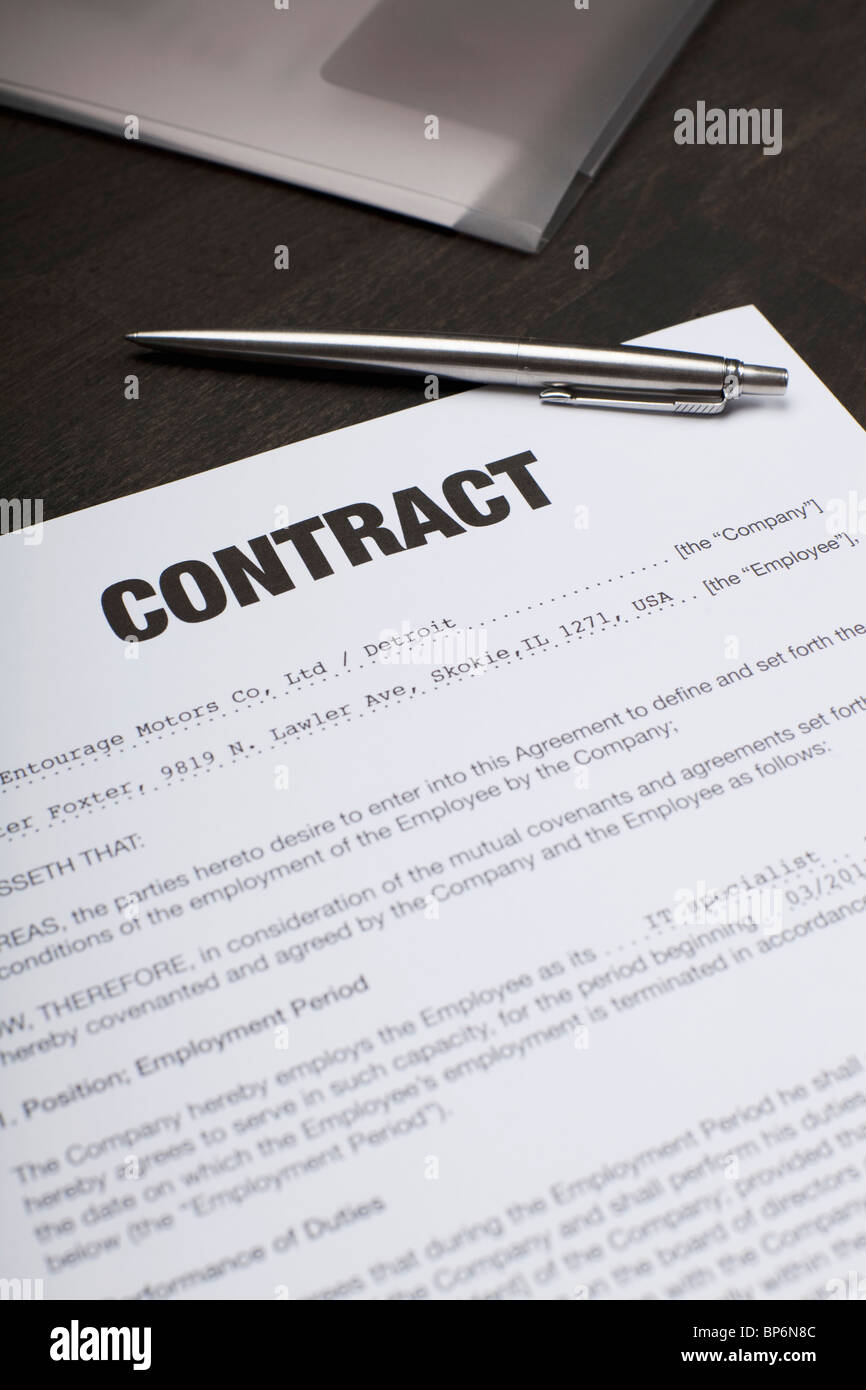 Arbeitsvertrag und einen Stift Stockfoto