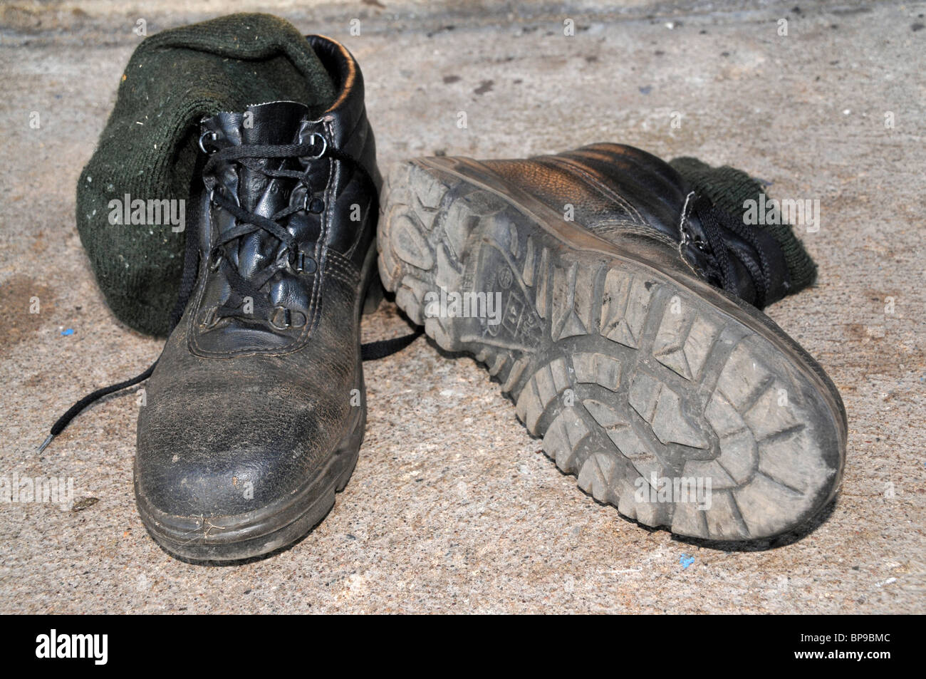 Ein paar Stahl-angeschnittene Ärmel-Stiefel. Stockfoto