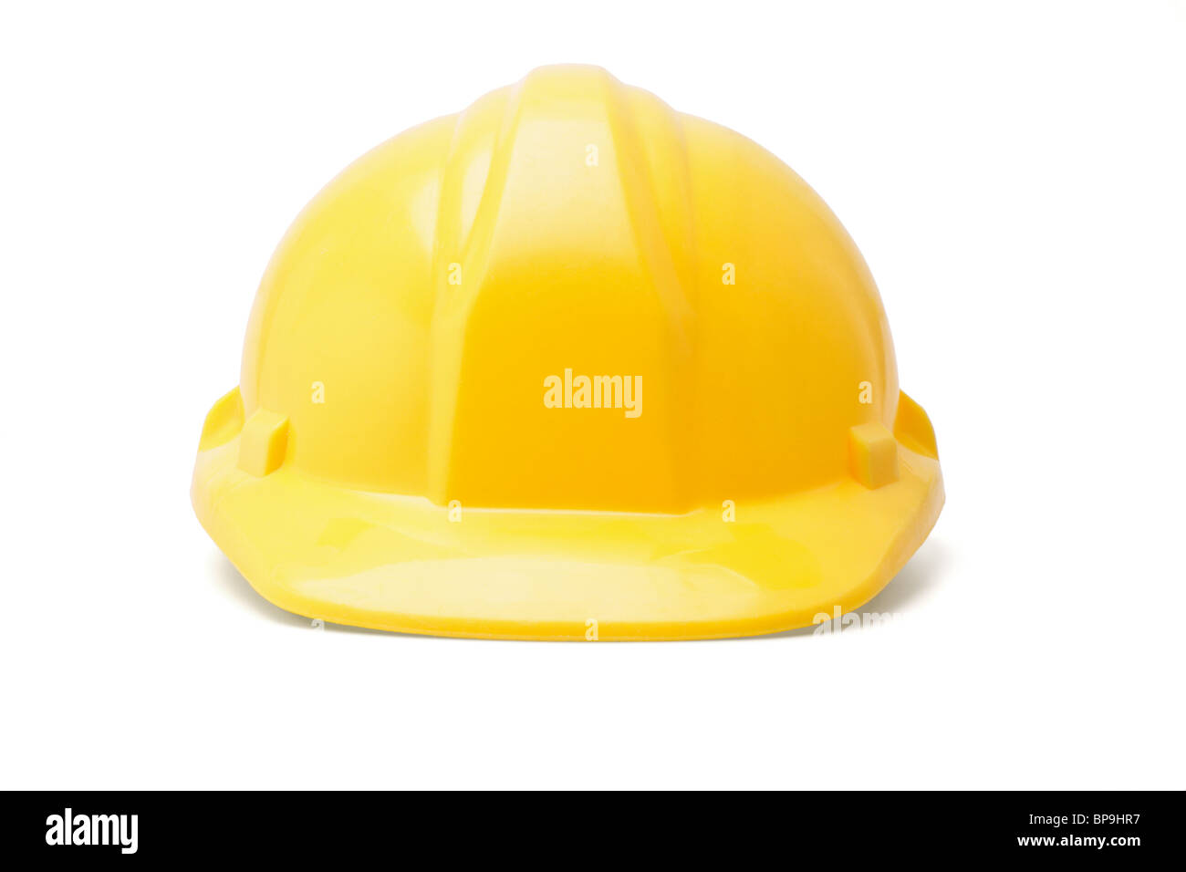 Gelben Bauarbeiterhelm Schutzhelm auf weißem Hintergrund Stockfoto
